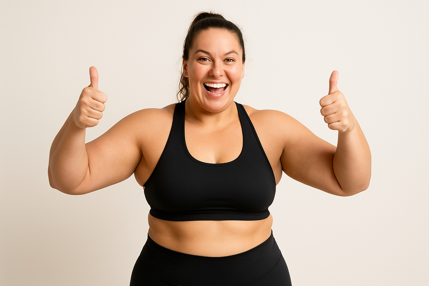 offwhite backgroound, 180 lbs girl wearing work out gear. doouble thumbs up gesture